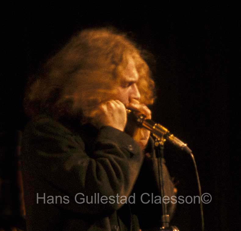 A close up of Ian Anderson playing the harmonica at Stockholm Konserthus 9/1/69